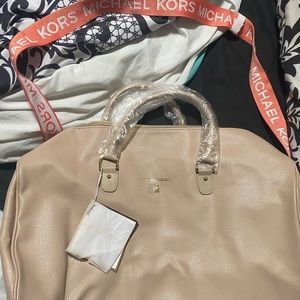 Large Michael Kors tote plastic still on everything brand new never used